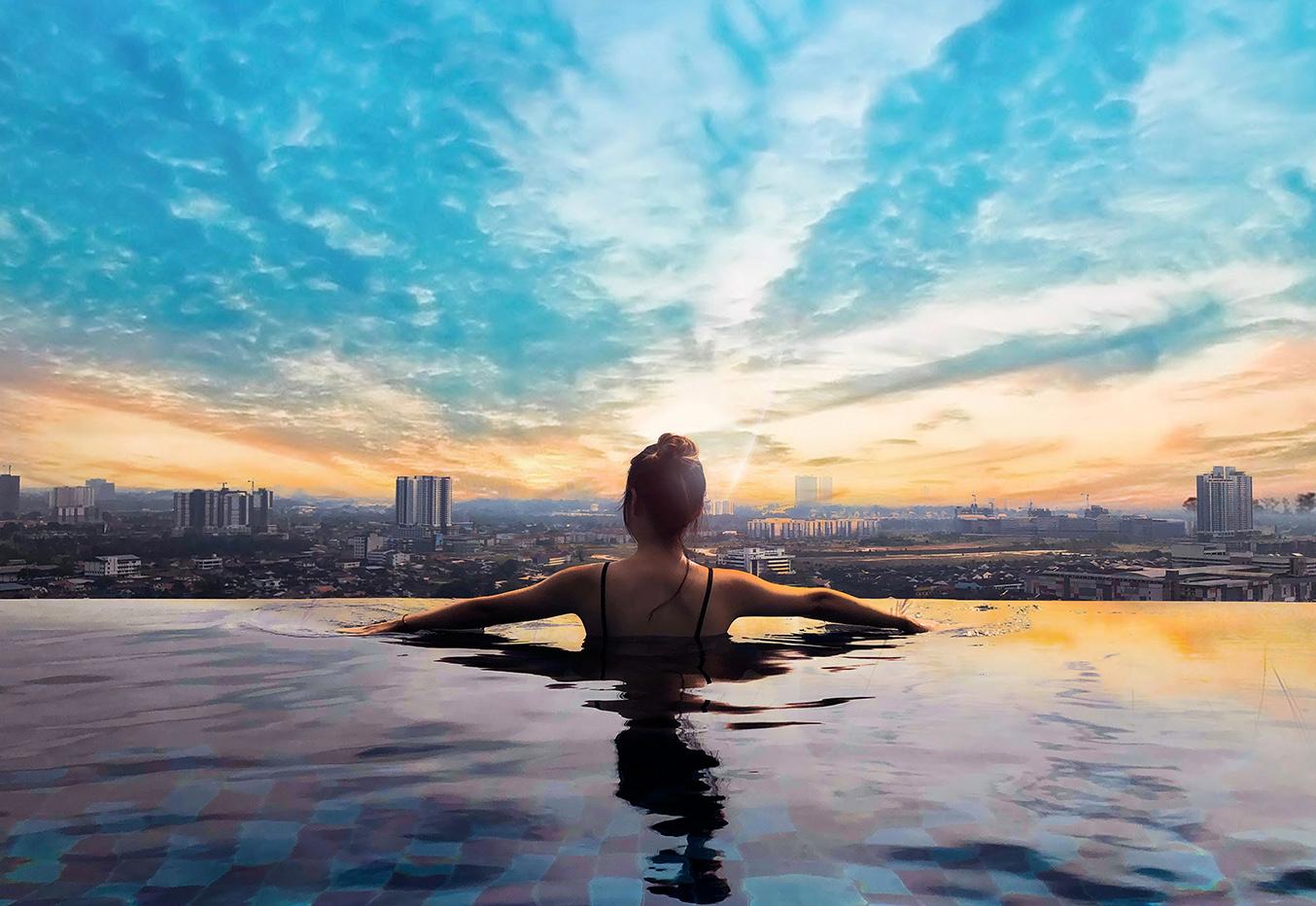 Woman in infinity pool