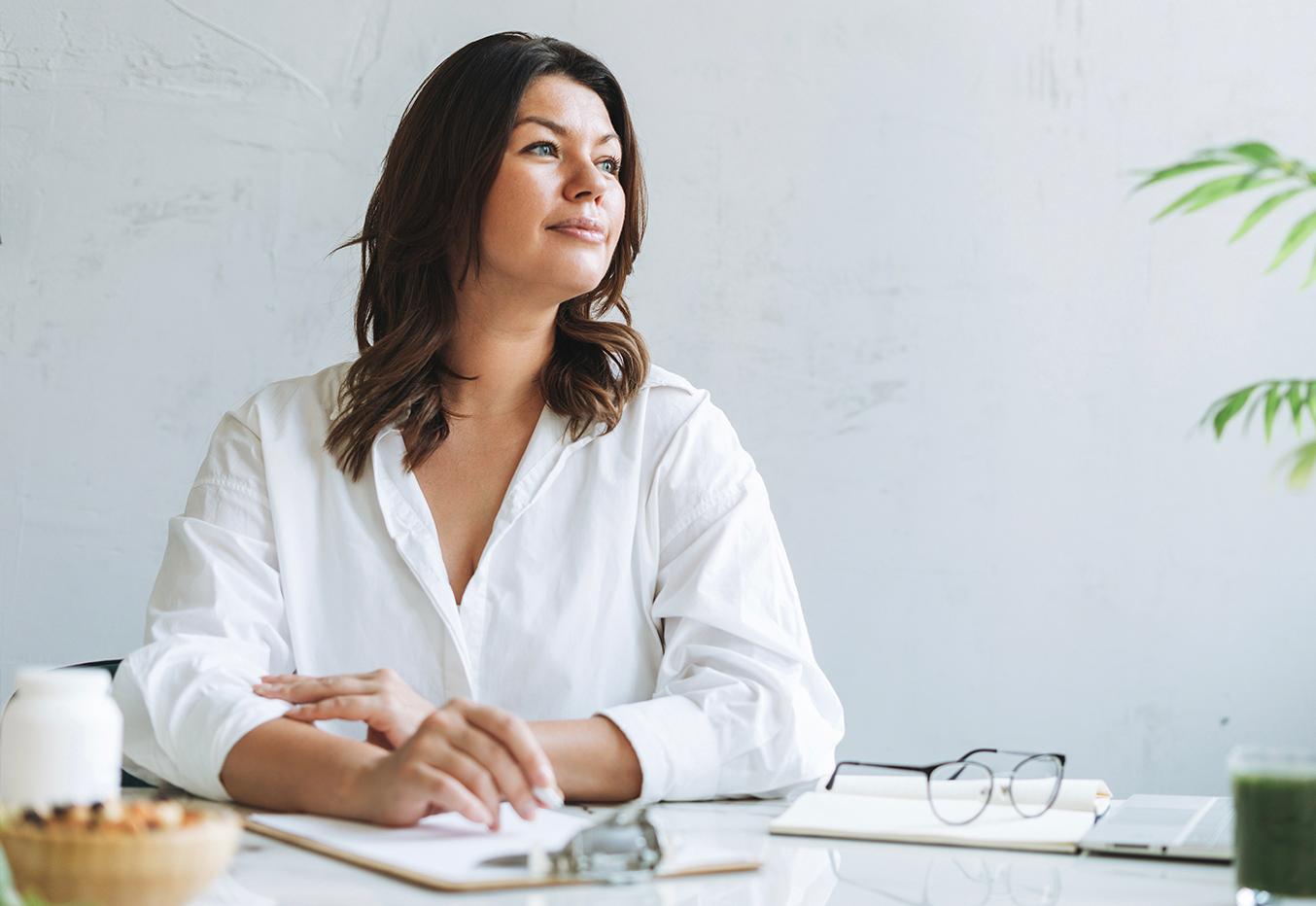 woman looking out window