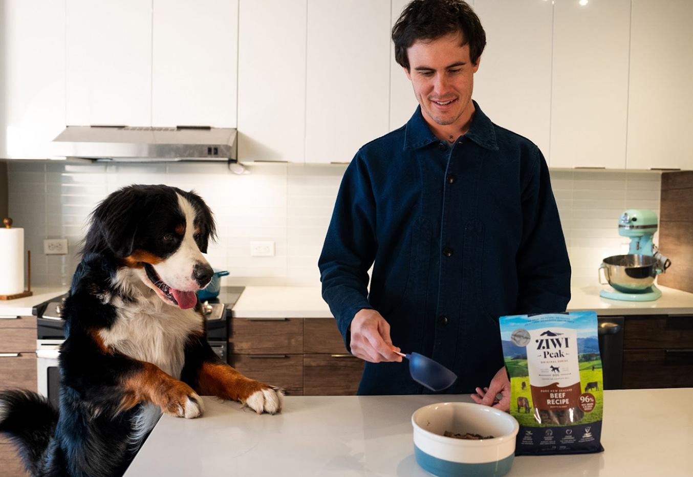 Man feeding his Dog